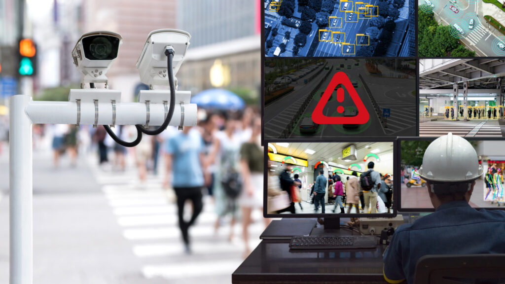 Person behind CCTV footage, with a screen indicating a malfunction.